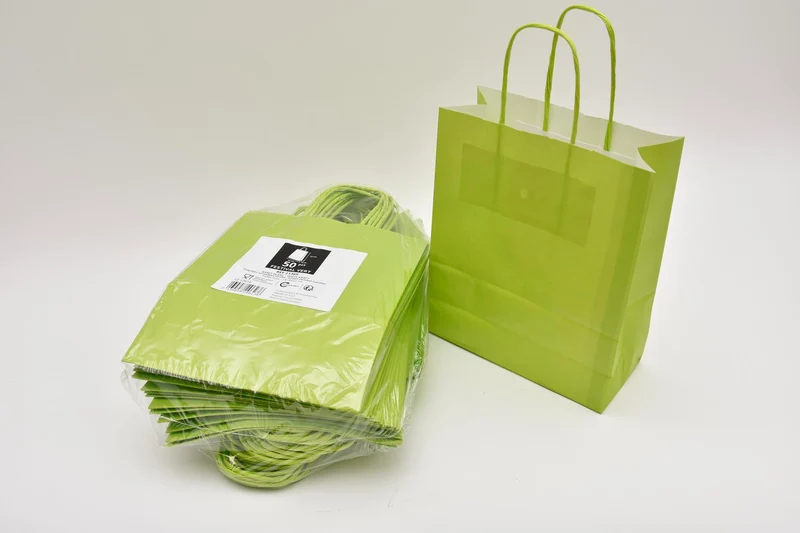Draagtas Lime kraft 18+8x22cm a 50 stuks gedraaid handvat