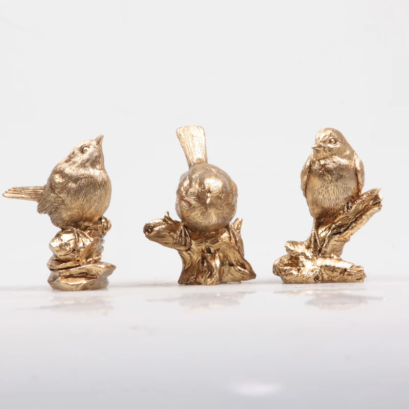 VOGEL OP STEEN/STRONK 3 ASS 8.5X5X10 CM GOUD