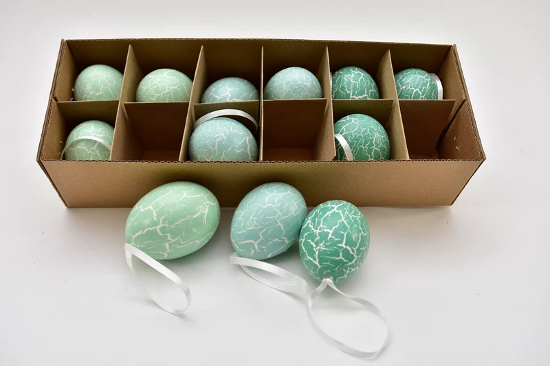 Doos á 12 kippenei aan lint bewerkt Turquoise mix
