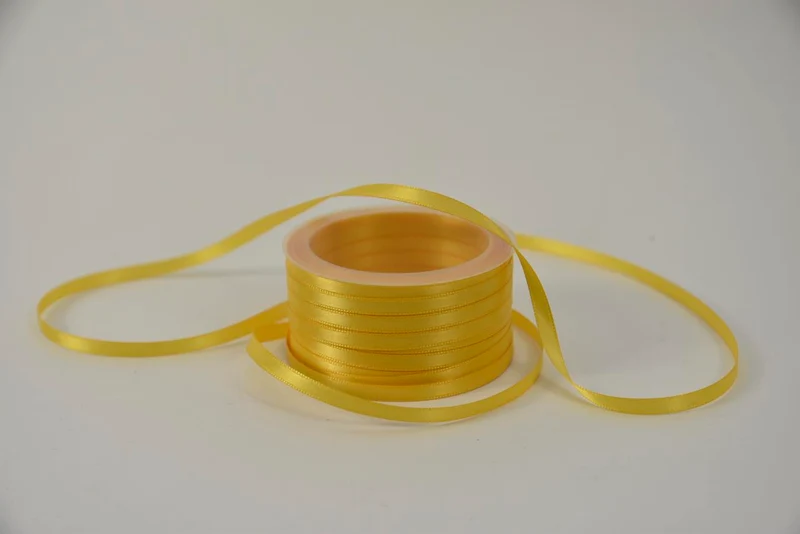 Satijnlint 6 mm x 50 mtr geel
