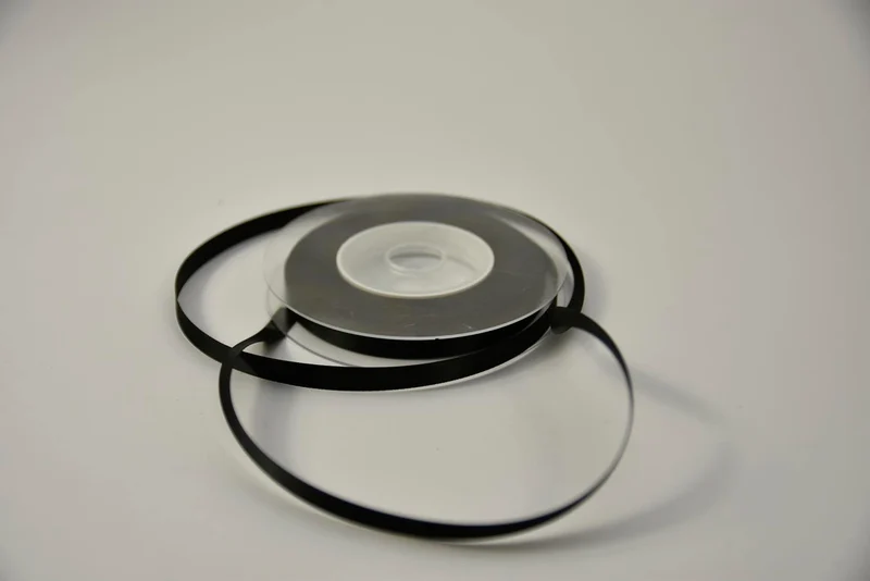 Satijnlint 10 mm x 25 mtr zwart