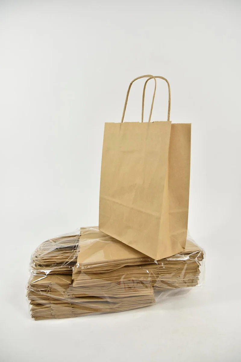 Draagtas bruin kraft 18+8x22 cm a 50 stuks gedraaid handvat
