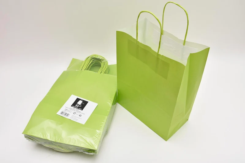 Draagtas Lime kraft 23+12x30cm a 50 stuks gedraaid handvat