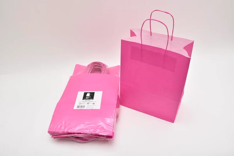 Draagtas Fuchsia kraft 23+12x30cm a 50 stuks gedraaid handv.