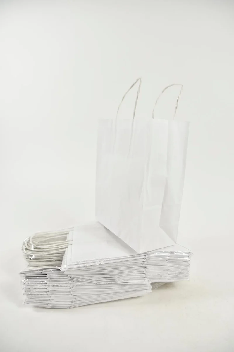 Draagtas Wit kraft 18+8x22cm a 50 stuks gedraaid handvat