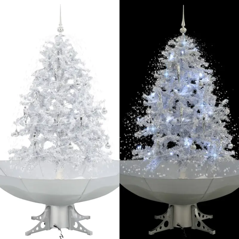 Kunstkerstboom met vallend sneeuw en levendige takken